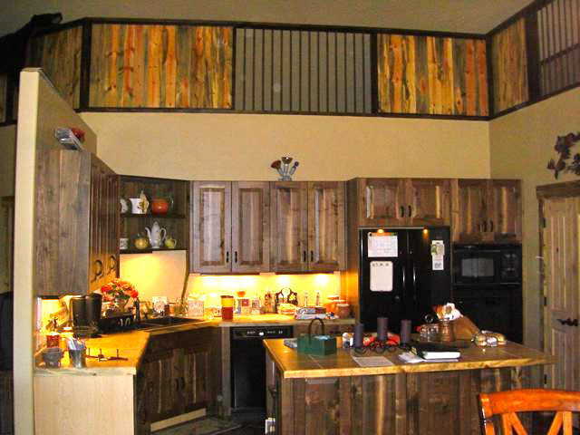 A chef’s delight! — This kitchen adds to the beauty and functionality of this home. Door on the right opens onto a 64-square-foot pantry.