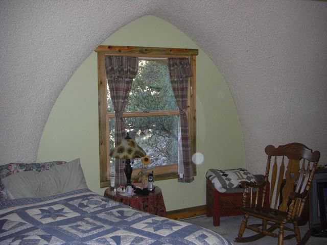 Master bedroom — Sitting on top of 6 feet of vertical wall and overlooking the forest, this master bedroom is well over 200 square feet and superbly comfortable.