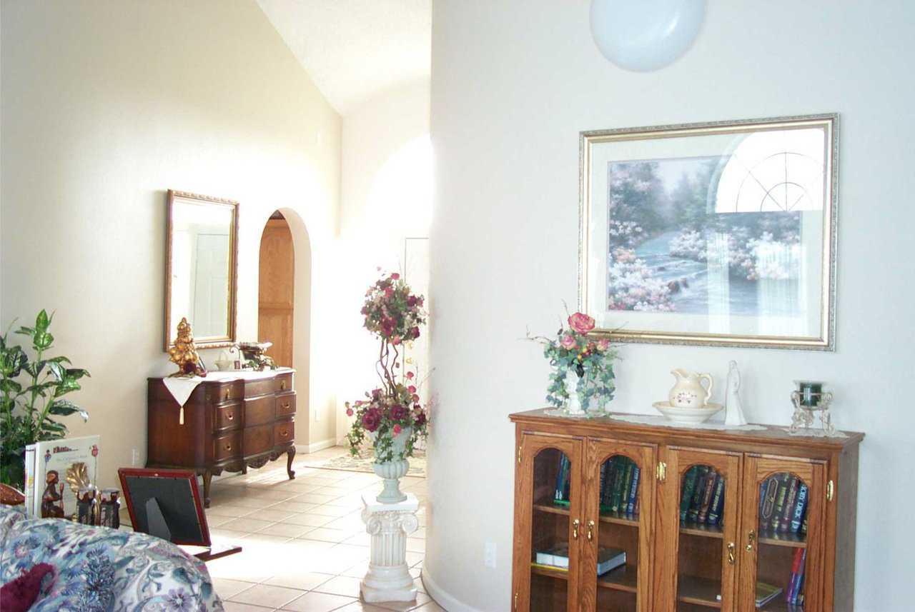 Enhancements — Artwork, flowing light and floral arrangements enhance this dome home.
