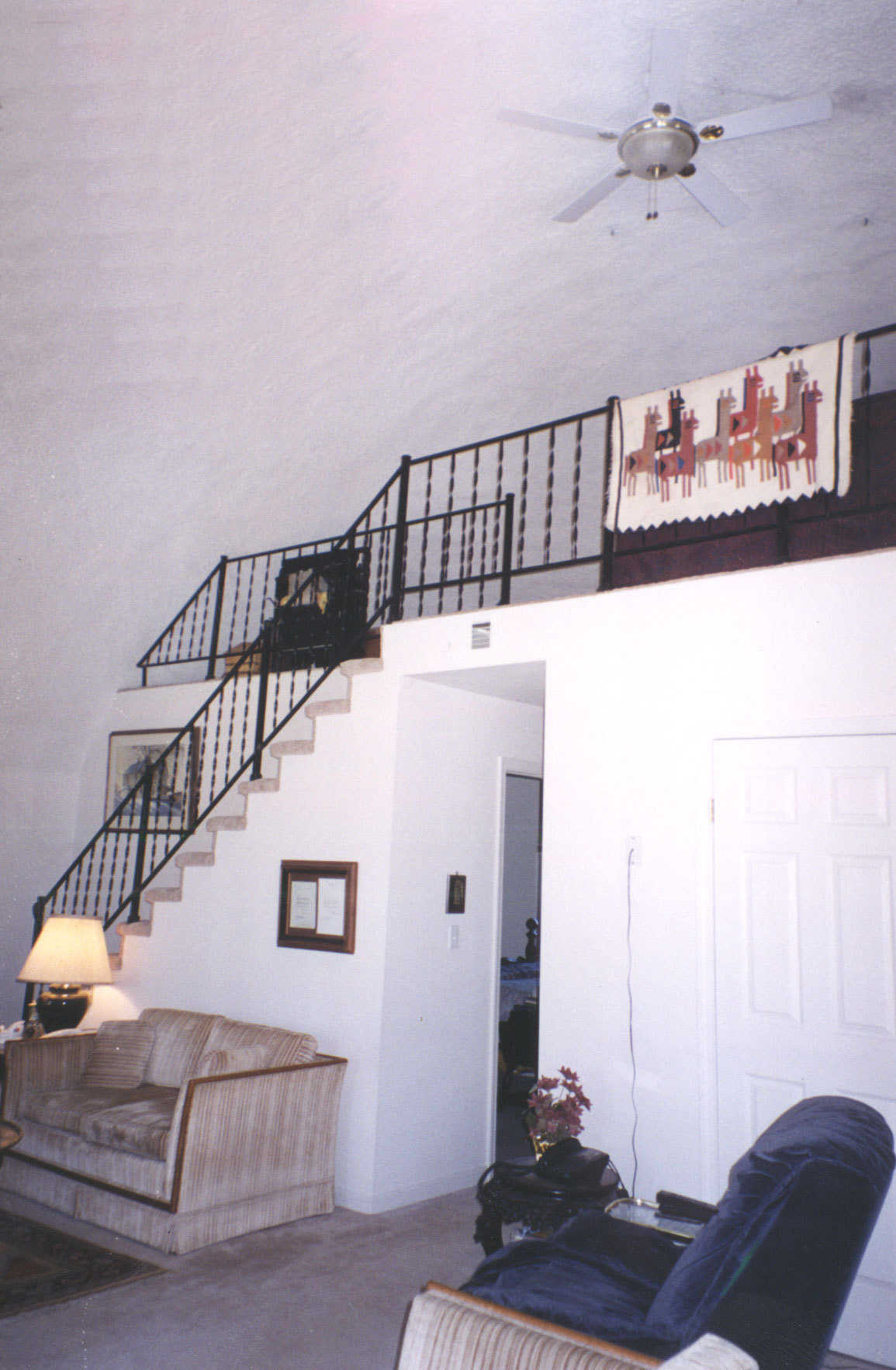 Staircase — The staircase leads to a loft that overlooks the main living area.