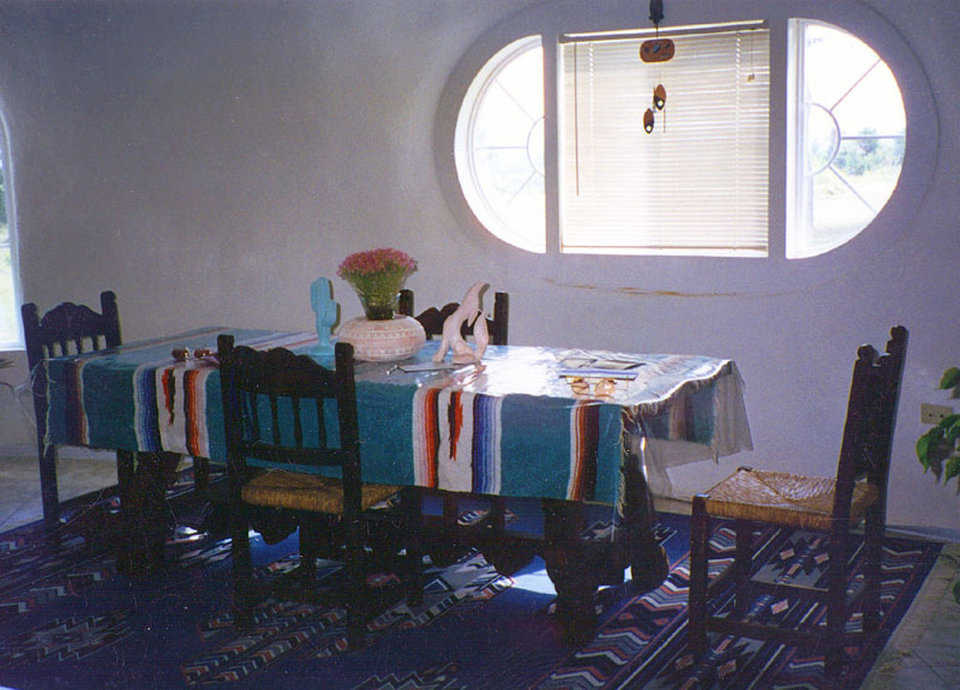 Southwestern motif — It complements the dome’s environment. Walls are an antique white and the tile floors have a sandy, marbleized look.