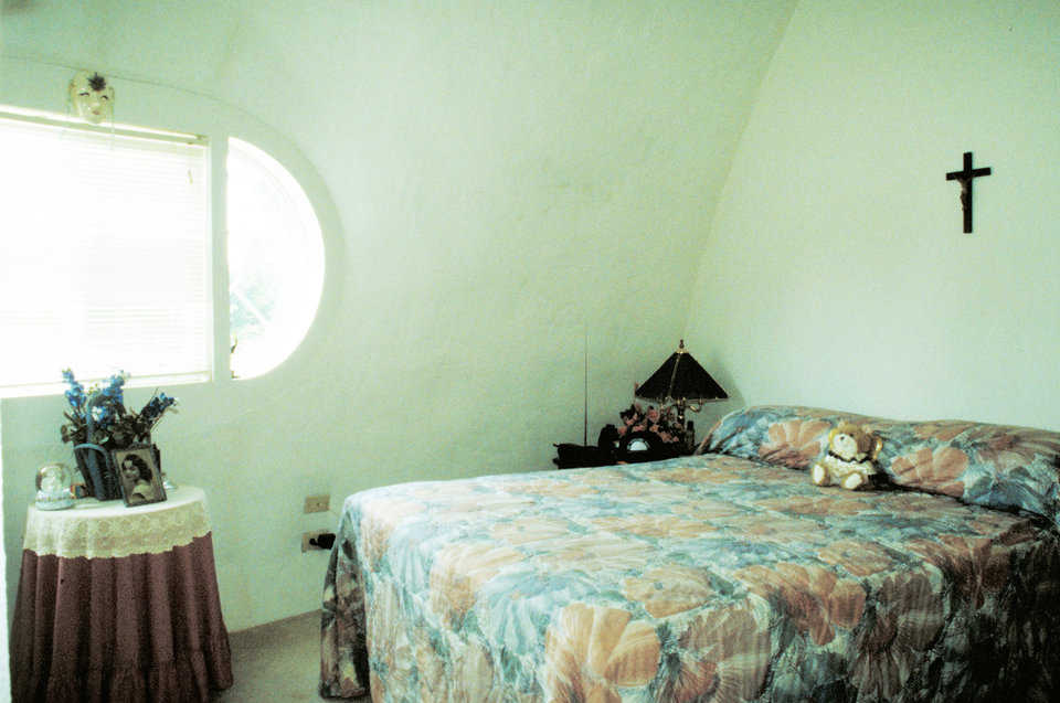 Bedroom — Its rounded windows, curves and arches provide a soothing serenity.
