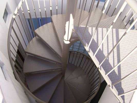Going round — A spiral staircase leads to the upper level.