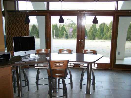 Bright work area — Windows provide light and a view and turn this office into a pleasant work area.