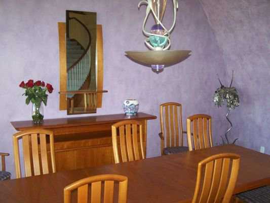 Dining — Its long, rectangular table can accommodate eight.
