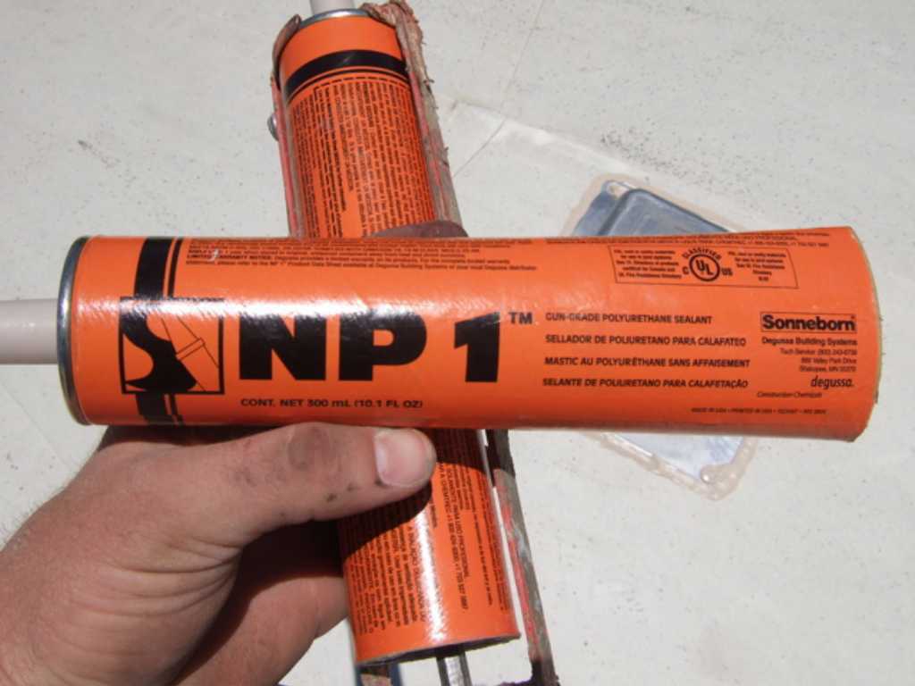 NP 1 — NP1 Single part Urethane caulking used to glue down flange and water proof.