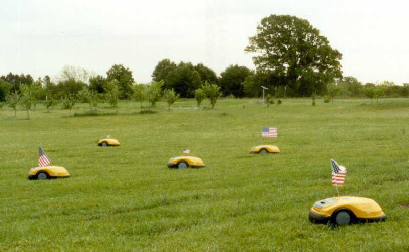 Robot Ranch. — Al calls his earth-bermed Monolithic Dome home Robot Ranch because of the five self-propelled mowers that he has roaming over and cutting the grass on his 7.3 acres.