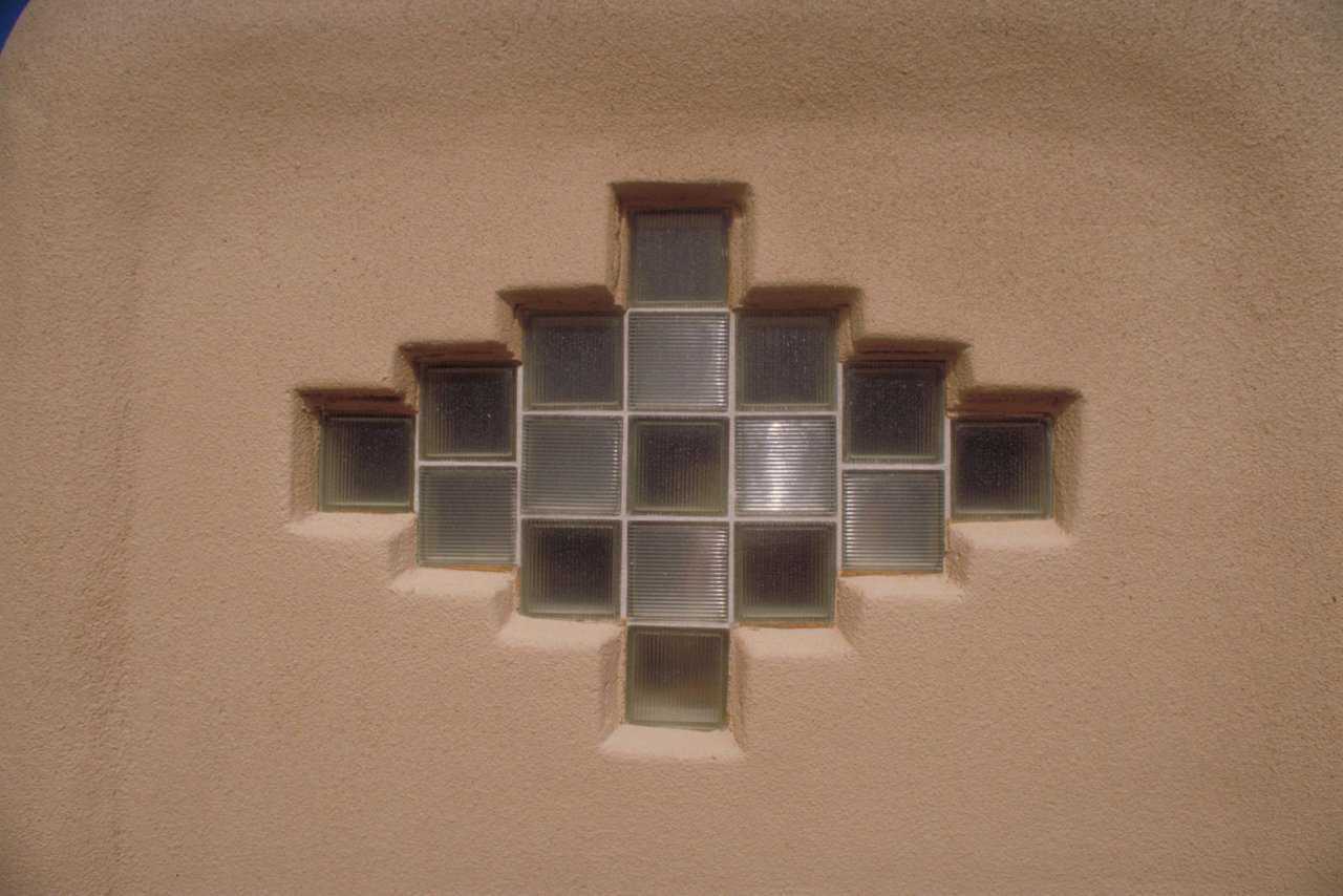 Let there be light — A glass brick window in a southwestern design lets sunlight illuminate the central living area.