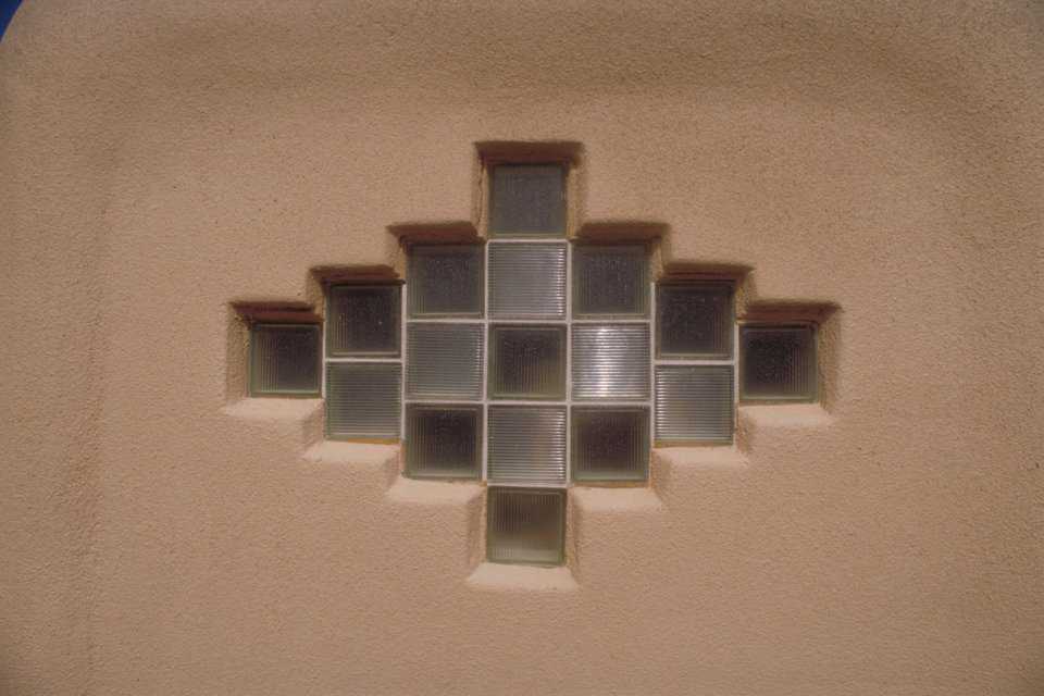 Let there be light — A glass brick window in a southwestern design lets sunlight illuminate the central living area.