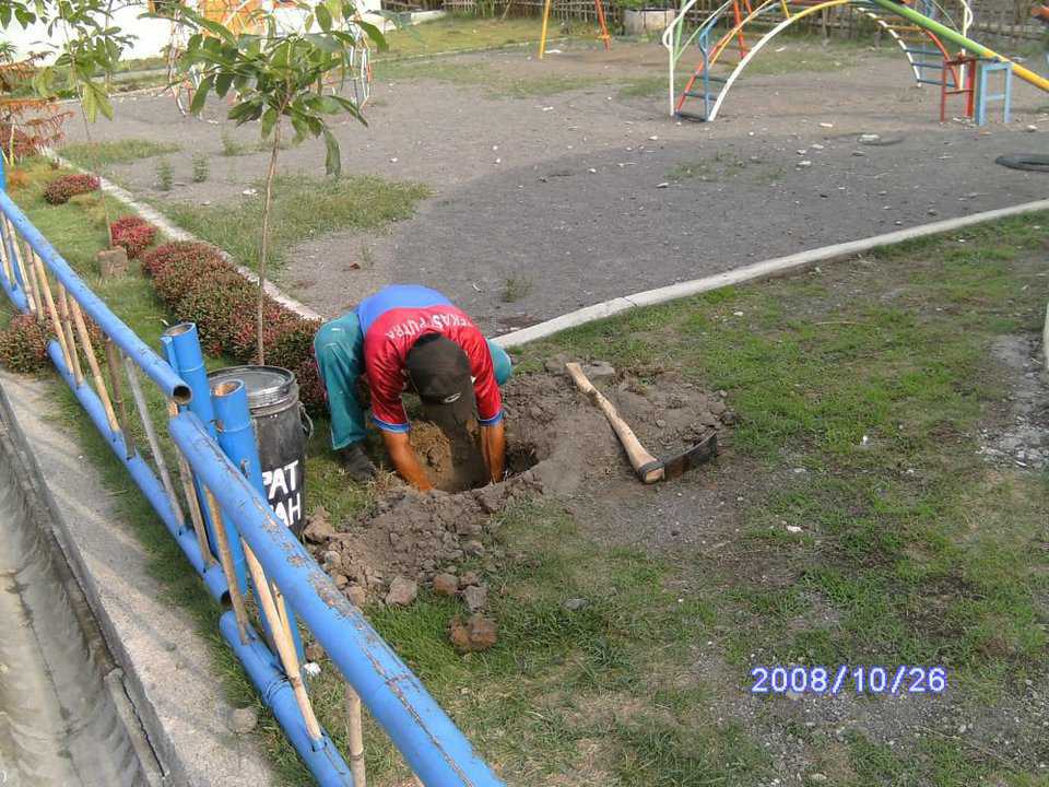 Hard Work — Villagers are determined to plant trees for shade and dust control in all the public areas.