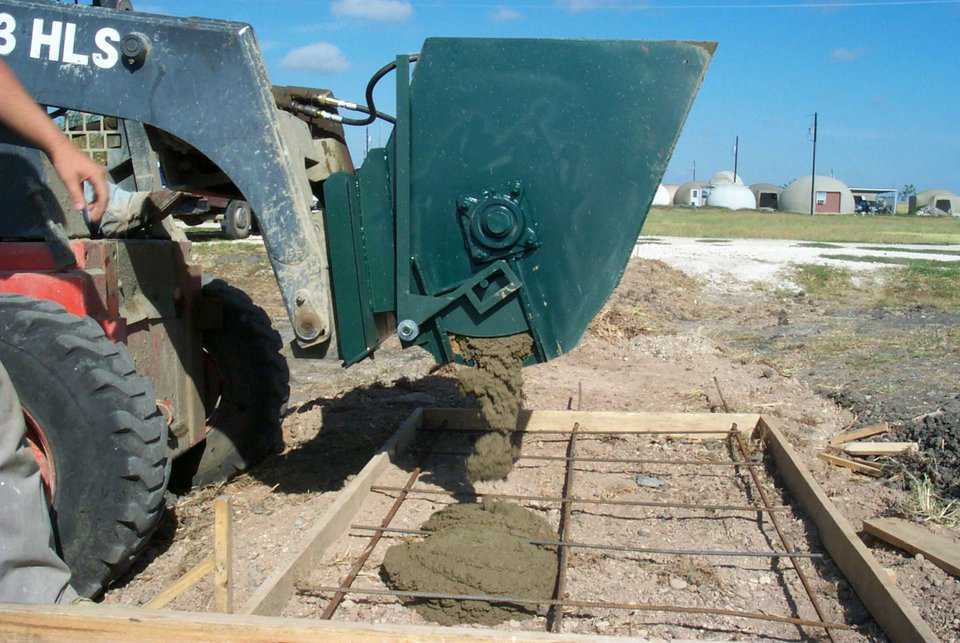 The Monolithic Mixer can also discharge from a chute on the side. This side dump is especially handy for filling post holes, pilings, etc.