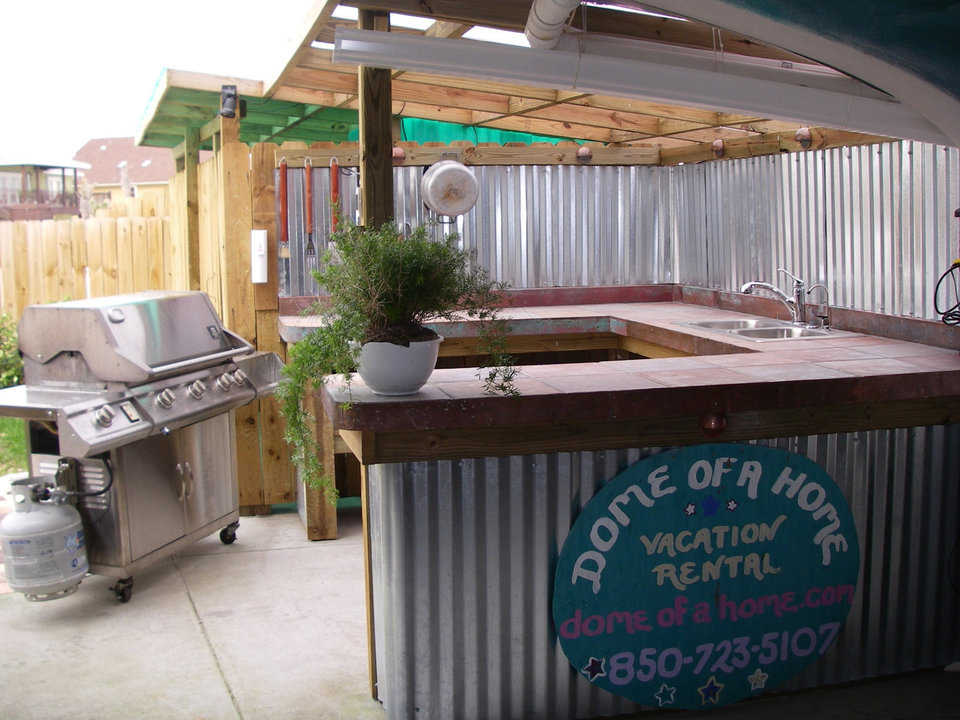 How about a cookout? — Dome of a Home’s grill area provides everything but the steaks.