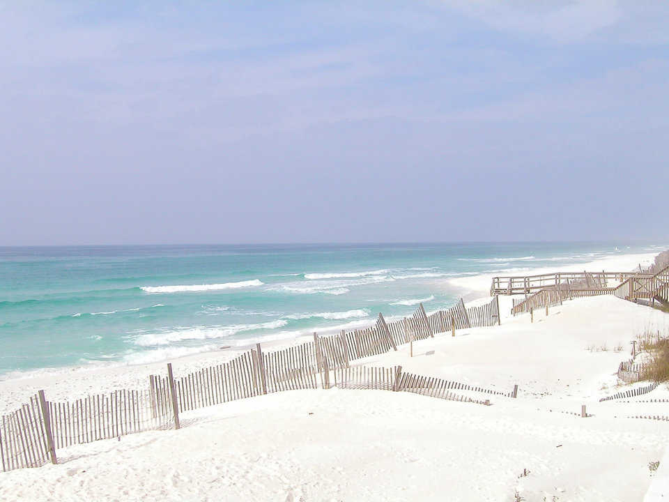 Sparkling beach — At Dome of a Home you can skip down the front stairway and into the ocean.