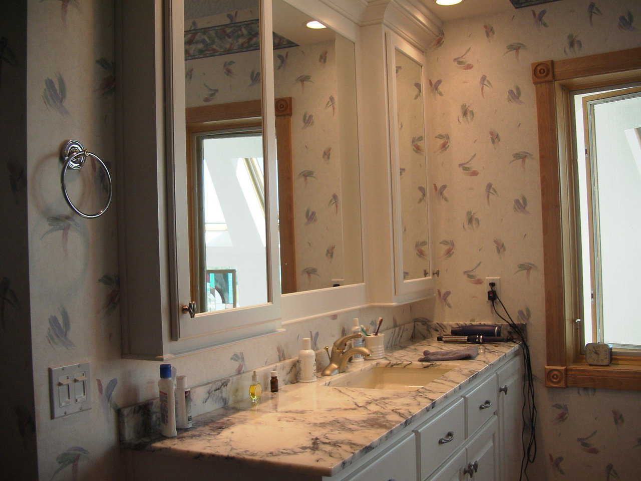 Twin Bathrooms — This dome-home includes his and her bathrooms, each with marble countertops.