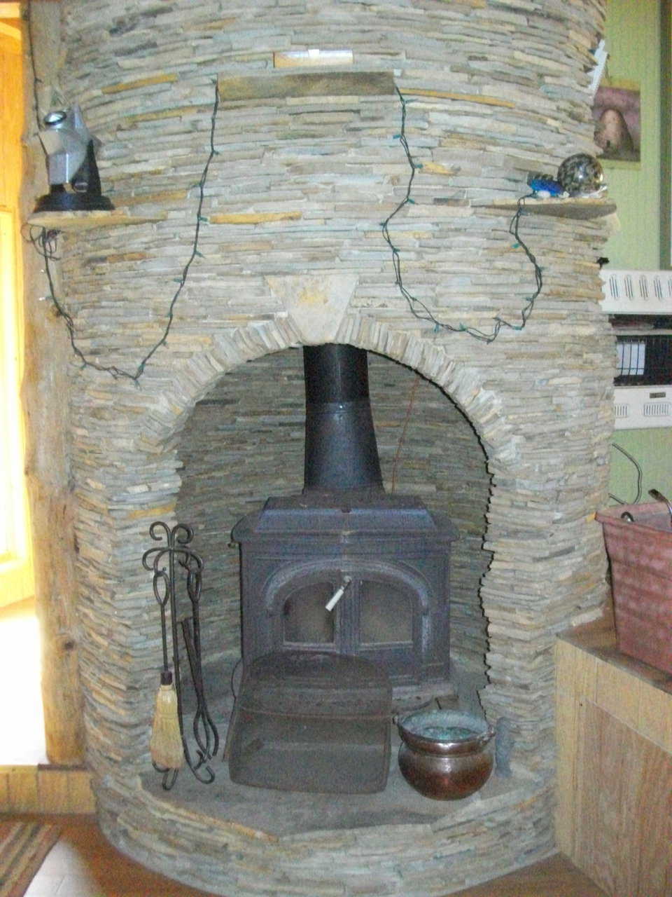 Fireplace – It’s based on a Russian design. Raised off the slab about 3 feet, the floor for the wood-burning stove is vented.