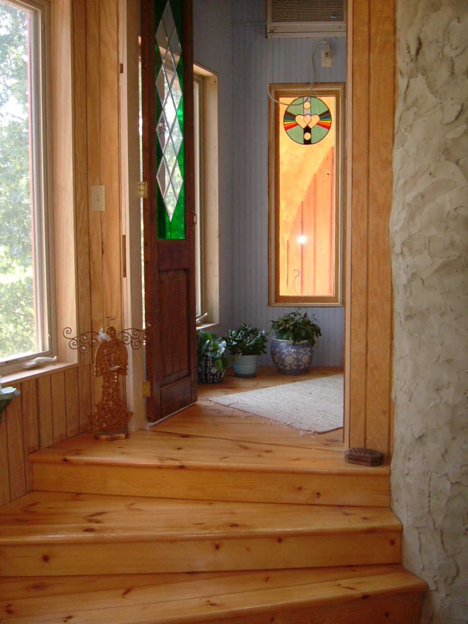 Come in, please! – A beautifully finished, wood-enhanced entry welcomes visitors to Cloudome.