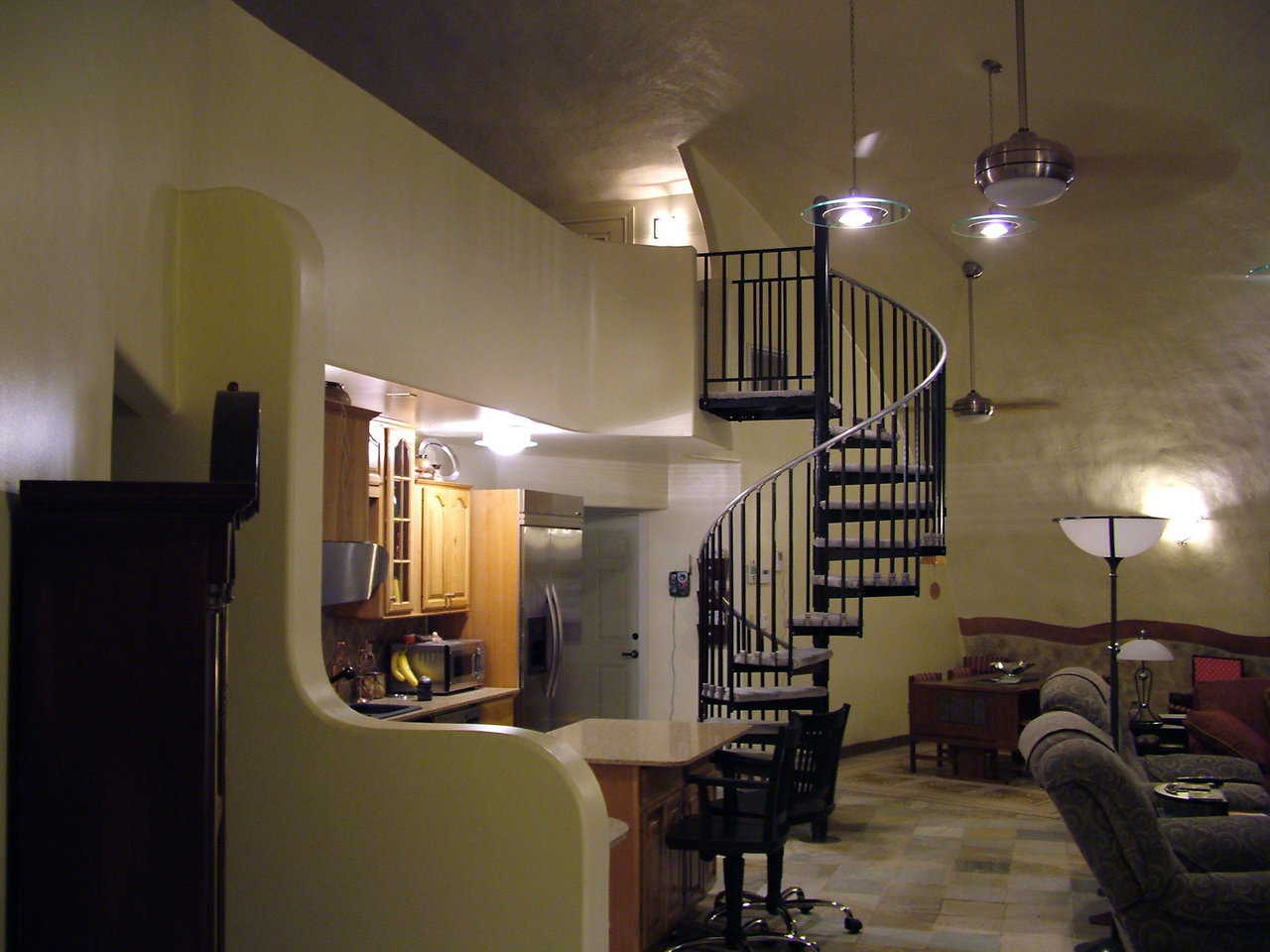 Going up! – A spiral staircase leads to the loft that circles about two-thirds of the dome’s interior. It has space for two bedrooms and a bath, should the Tassells decide to add.