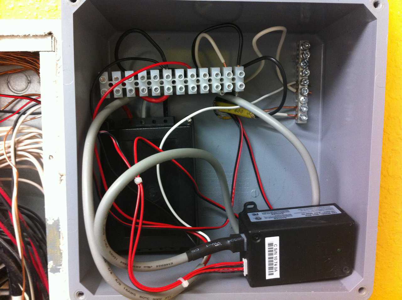 I installed a box next to my panel, since the panel didn’t have room for all the devices. This box holds the CT (bottom left) and the MTU. I purchased the box and the correction blocks at Home Depot.