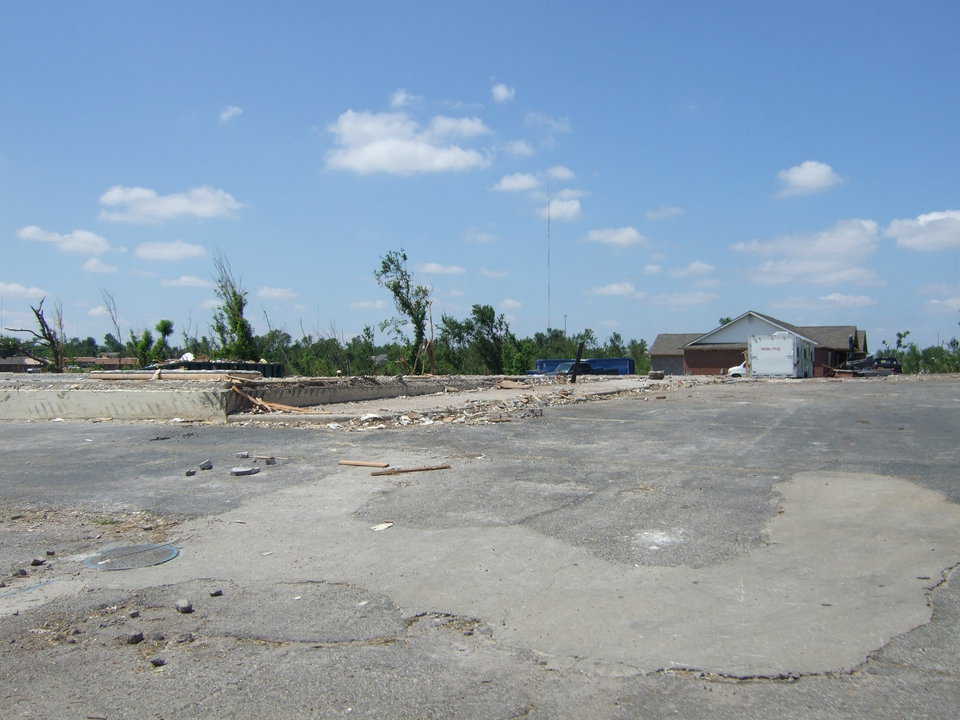 Note the concrete foundations. Unexplainably, entire blocks of homes were flattened, yet one was left virtually untouched.