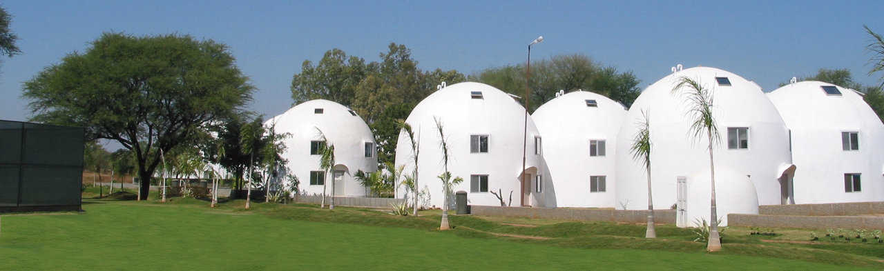 In New Oroville, India, Catalytic Software built a company-campus that includes Monolithic EcoShell multistory homes.
