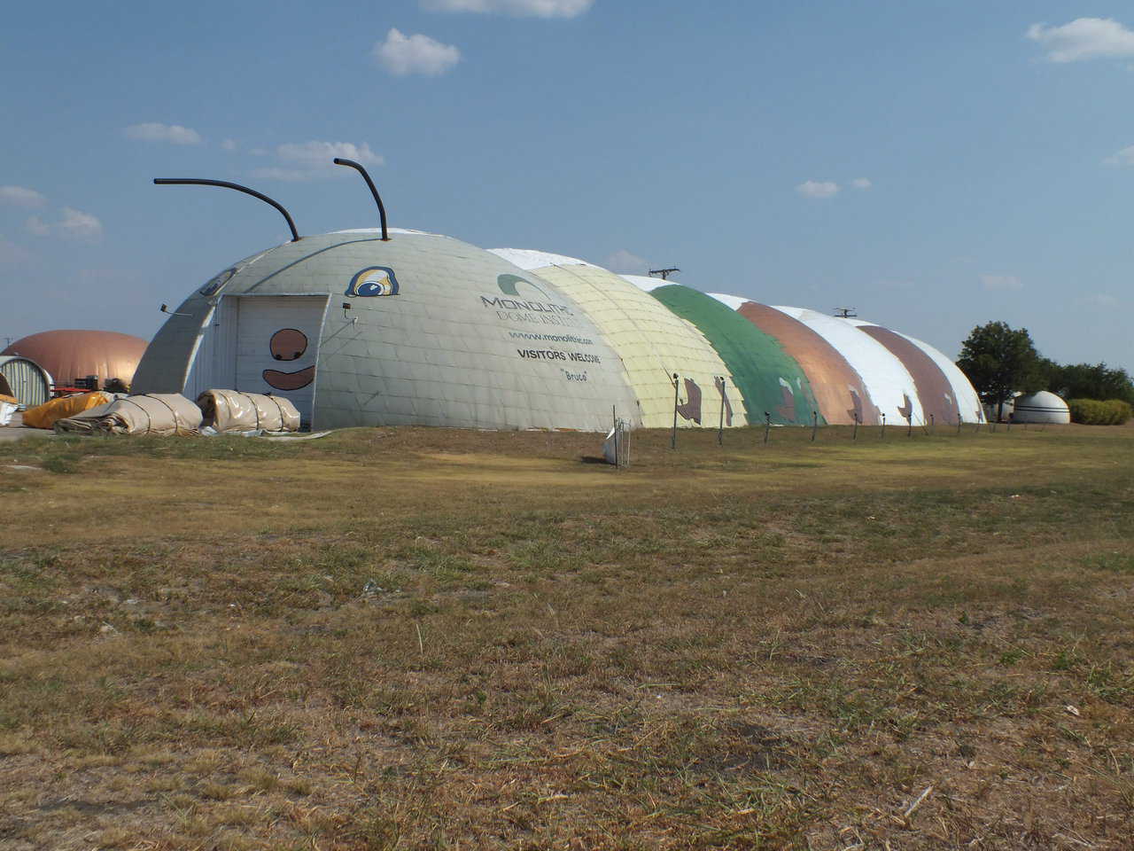 This is Bruco, whose name is the Italian word for caterpillar, our manufacturing plant in Italy, Texas. We cool this sprawling facility with a 5-ton AC unit, and in cold weather, we heat it just by leaving the lights on all night. Note: Domes look half as big from the outside as they do from the the inside.  