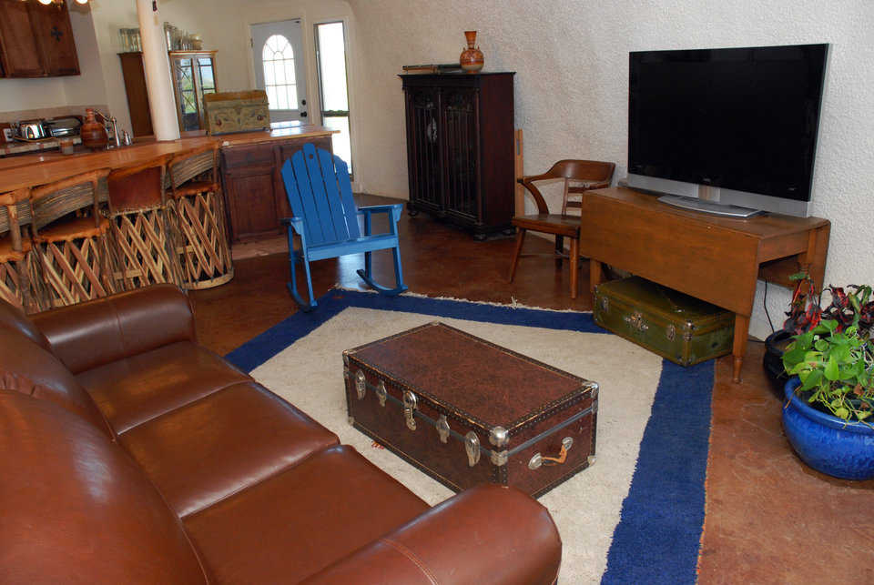 This is the larger and more ornate of two living rooms. A smaller one is on the second floor.