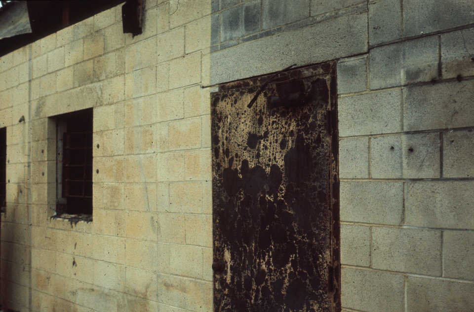 Warehouse was built in two sections.
One section was concrete block with a wood framed roof. The other section was a rigid frame metal building. The entire building was insulated with 1 inch of urethane foam on the interior surface.
