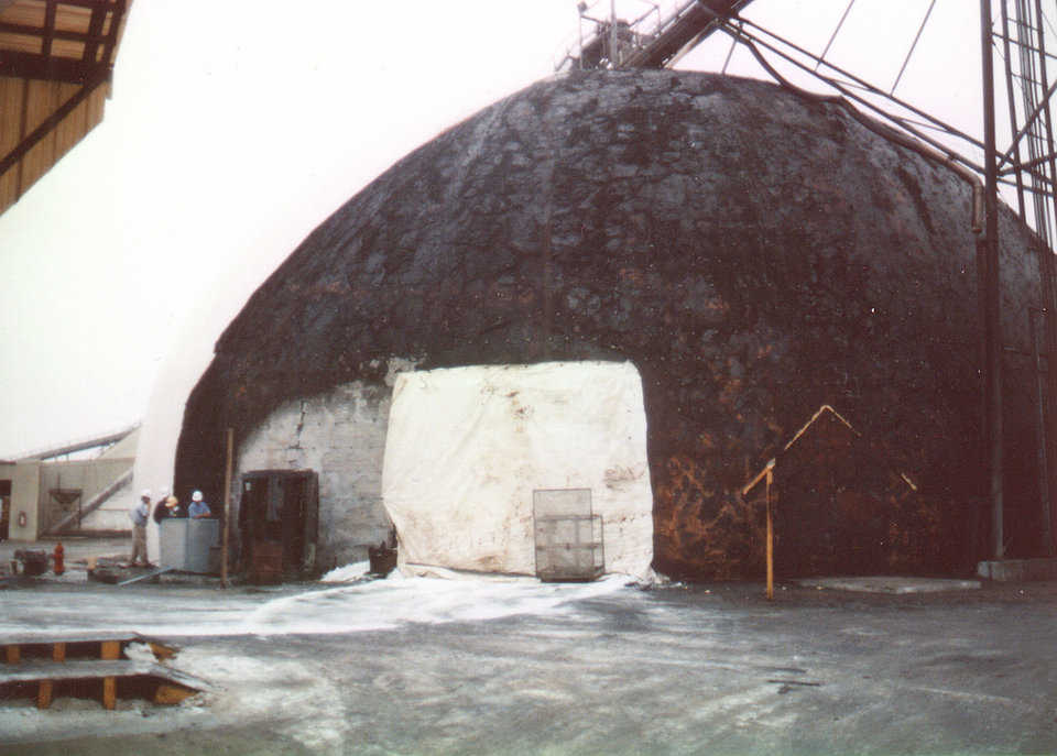 Fire Damage – Polyurethane only charred – Cargill – Channelville, TX
An outline of the wood building against the Monolithic Dome can be seen. This outline was left when the char from the two-by-fours was cleaned.