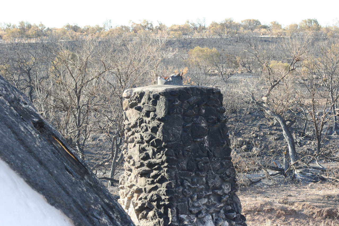 Only blackened landscape was visible for as far as the eye could see.