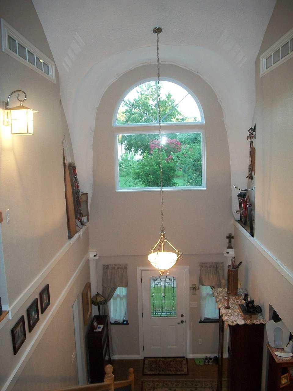 This gracious front entrance leads into a comfortable living area.