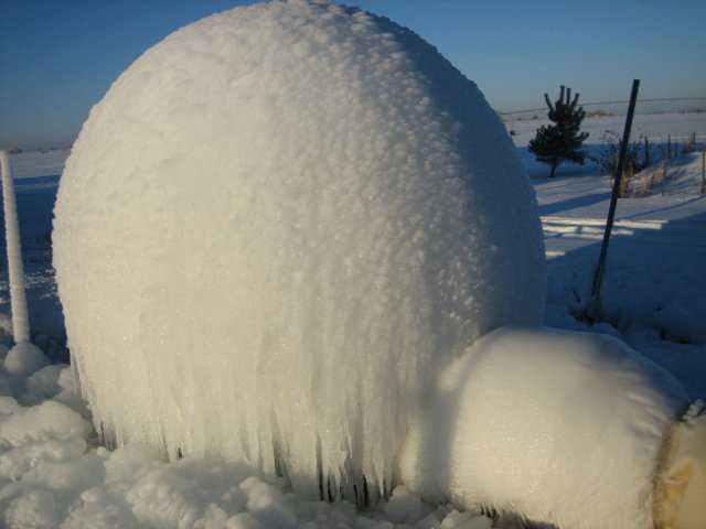 Chris built his own dome using water.  He sprayed this over an inflated Airform.