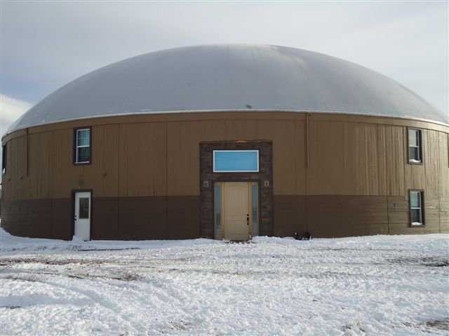 This spacious Monolithic Dome has a 90-foot diameter and two stories.