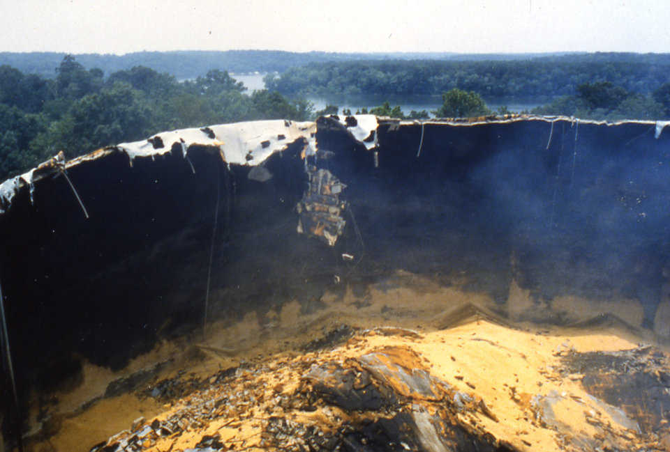 A fire burned inside for 60 days and ended in a large explosion. The dome’s top was completely destroyed. A grain explosion in a conventional silo will scatter concrete debris up to a half a mile away and will often cause fatalities. When the dome top opened, it released the explosion upward and sucked the debris back inside. No injuries, deaths, or other damage occurred.