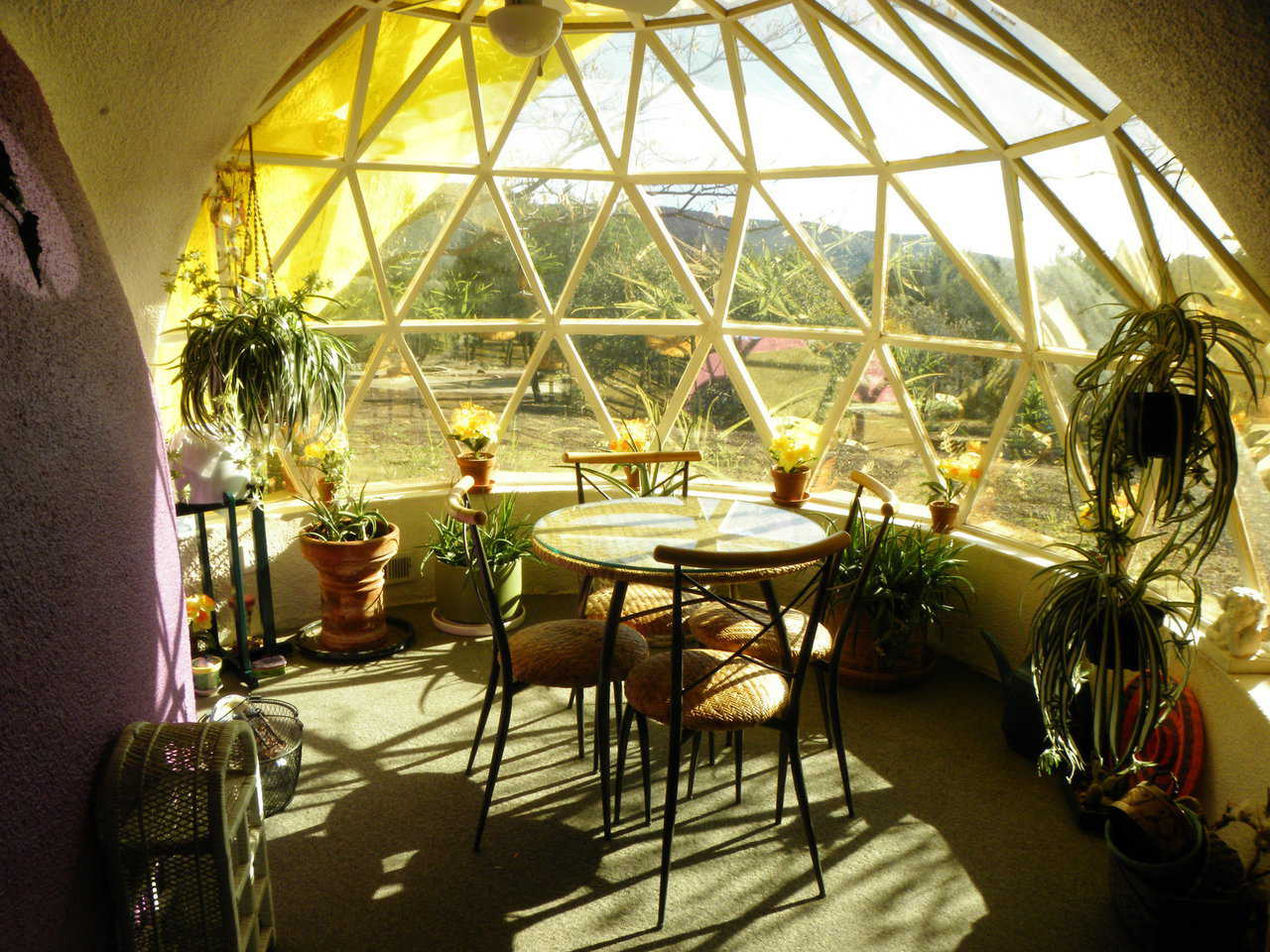 The sun brightens and warms this breakfast nook.