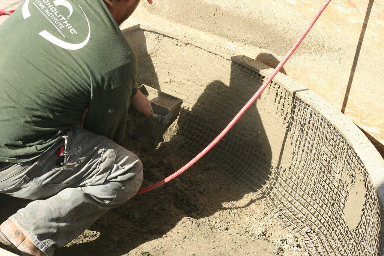 In this photo, our crew is finishing one of the garden boxes that will be planted with flowers and placed near our office.