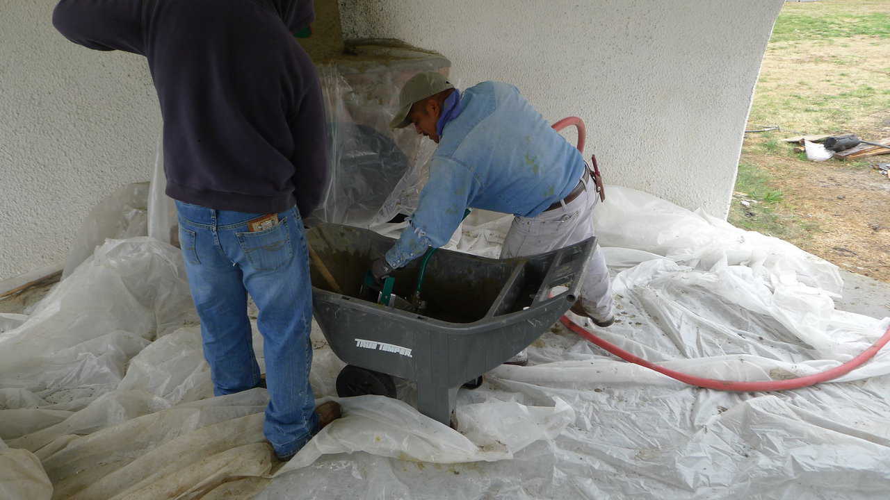 Scooping the concrete out of the mixer or wheelbarrow makes loading very fast. This ability to load the sprayer quickly hastens the completion of a project.