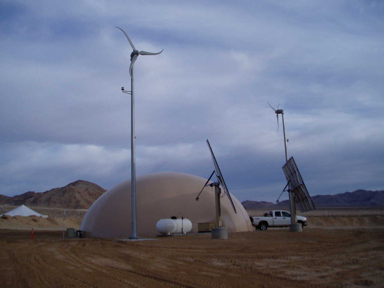 At Fort Irwin, Colorado, this 75-foot-diameter dome is equipped with windmills and solar collectors.