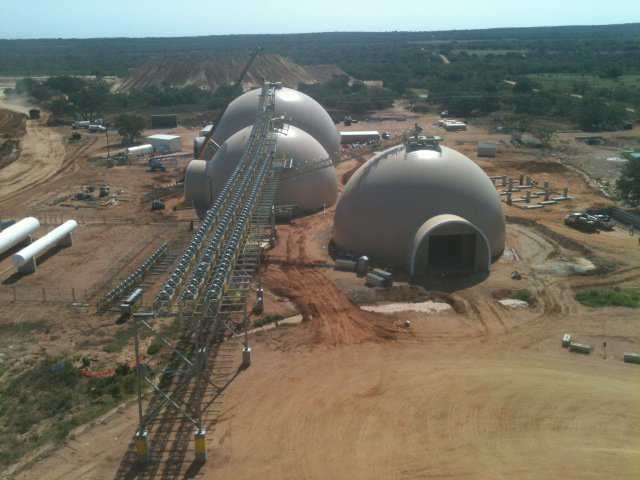 Each Monolithic Dome stores thousands of tons of frac-sand. Note the huge conveyors, resting on the domes, that carry the sand. This is a very special storage system for a very special product: frac-sand.
