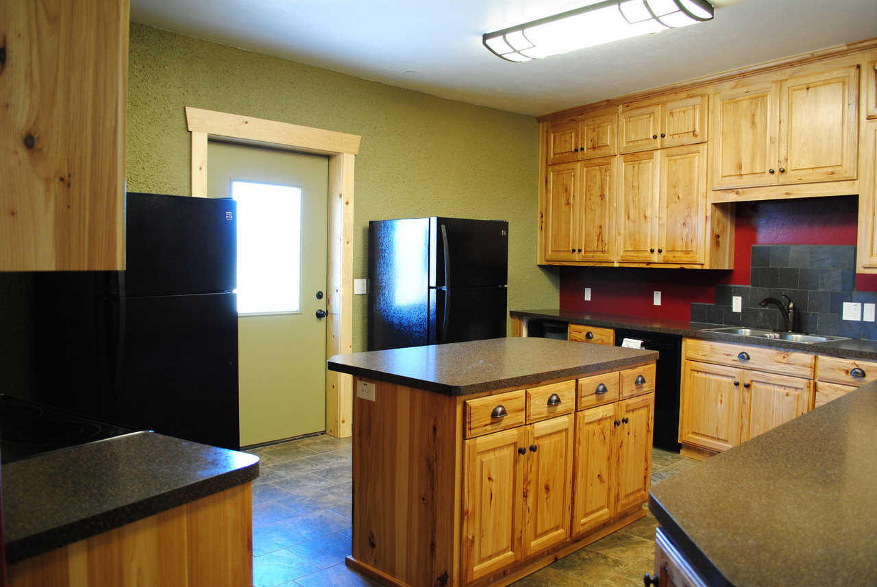 Beautiful wood cabinets provide plenty of storage.