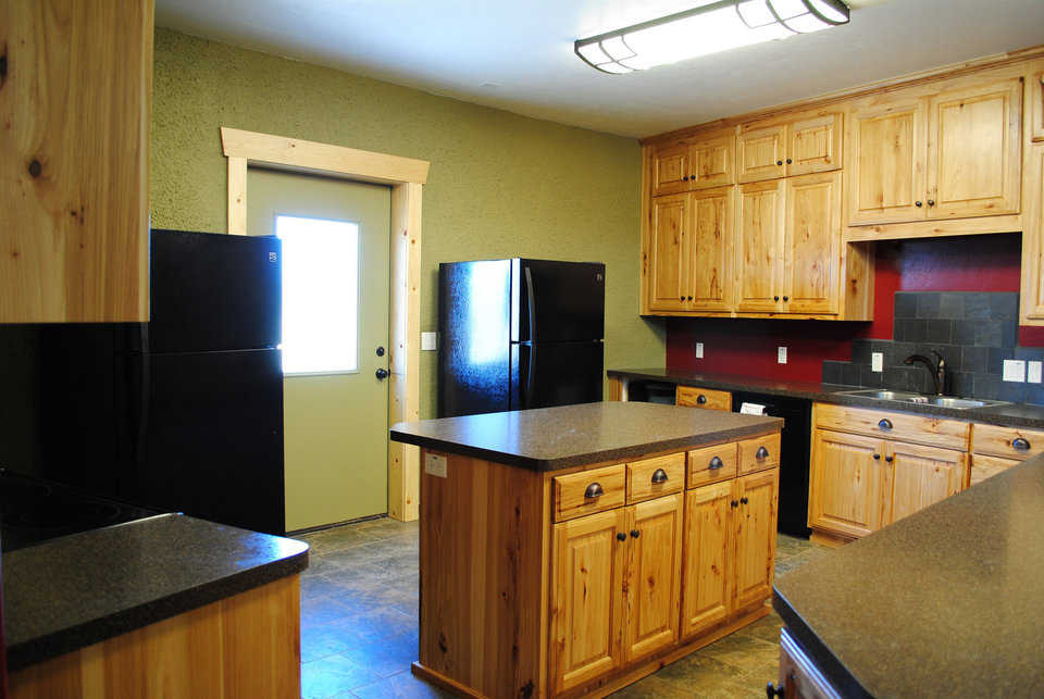 Beautiful wood cabinets provide plenty of storage.