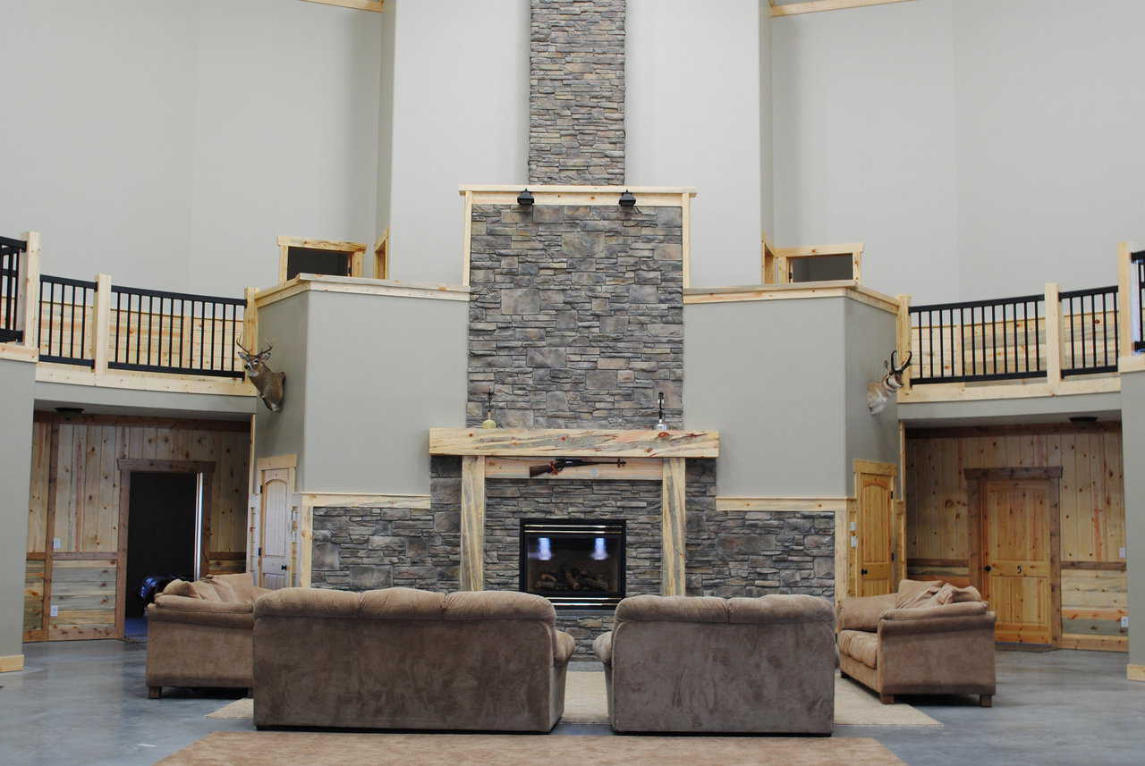 The fireplace is a cozy focal point in this large family/meeting room.