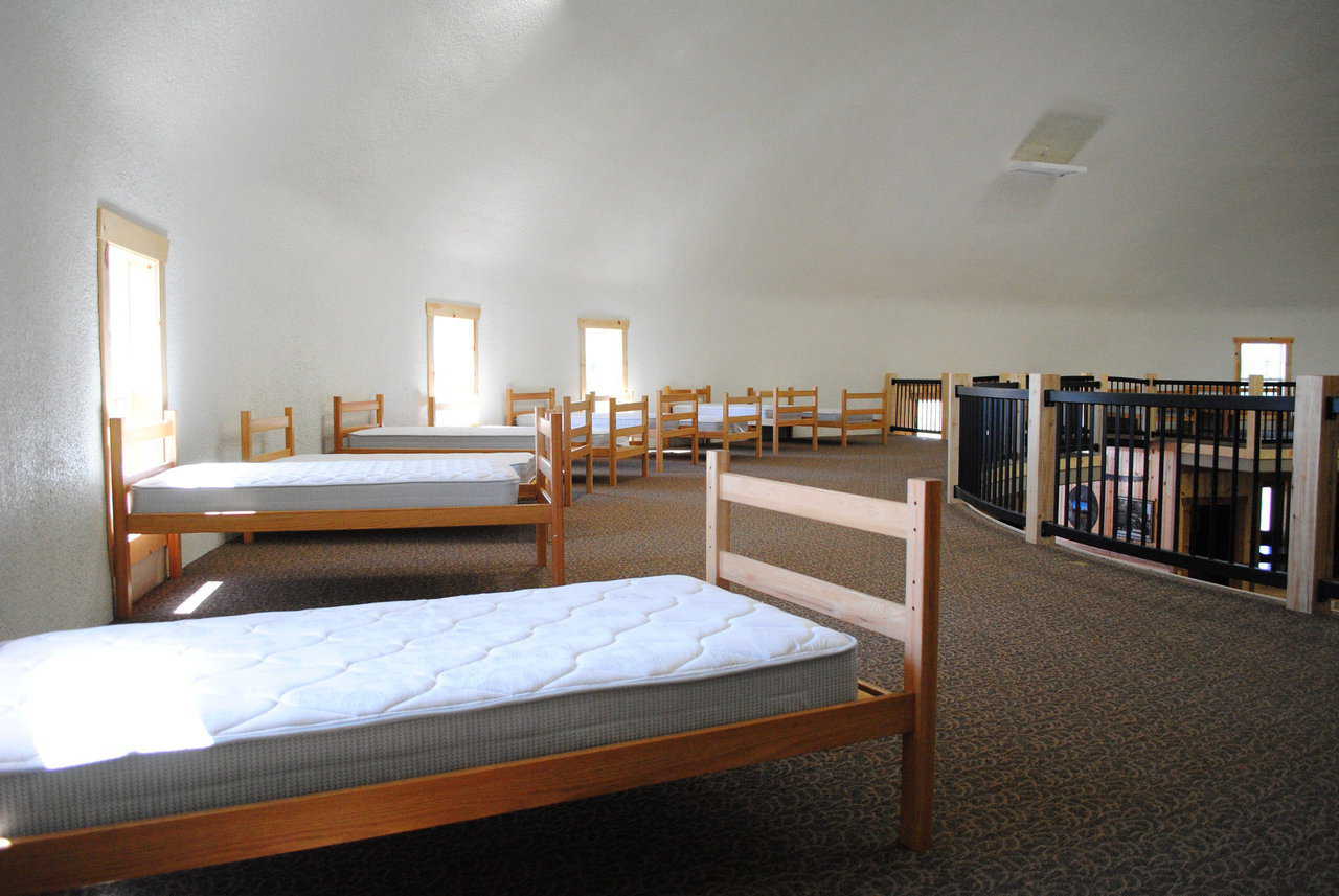 Twenty beds circle the loft.