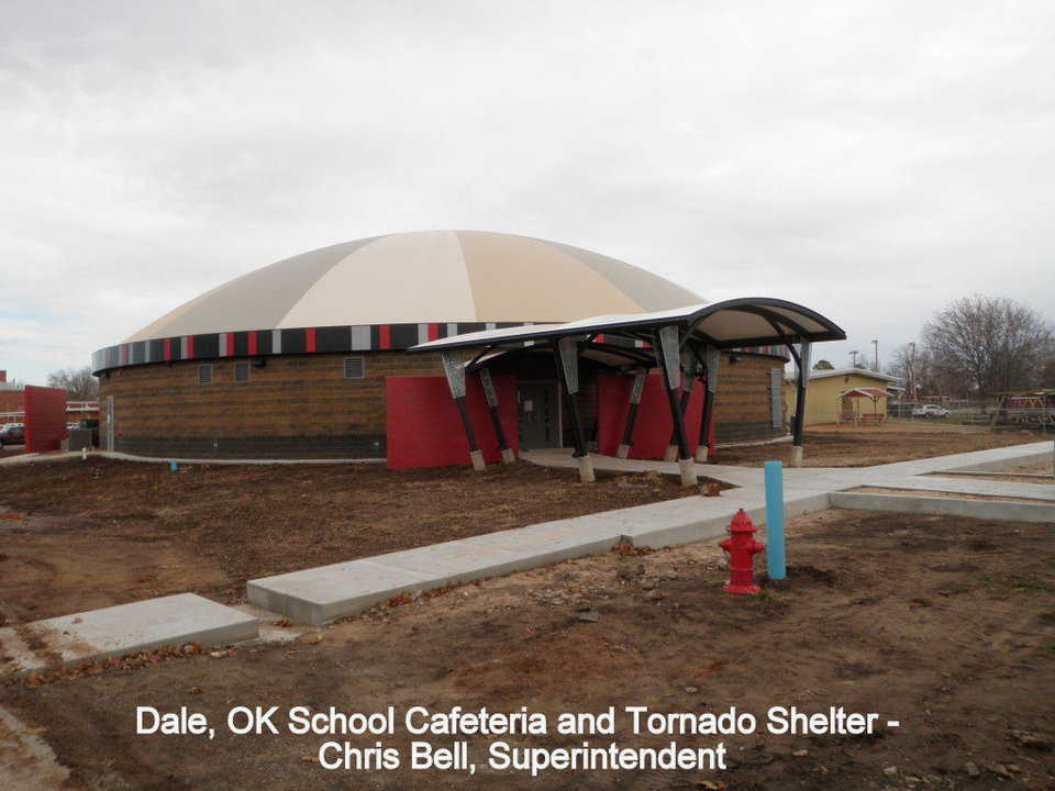 The walkway to the dome has a canopy over it, and the front door is FEMA approved for wind resistance.