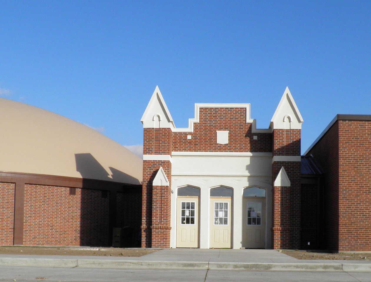 At Leoti, Kansas, the new domes designed by Architect Lee Gray had to blend attractively with structures built in 1928 and 1954.