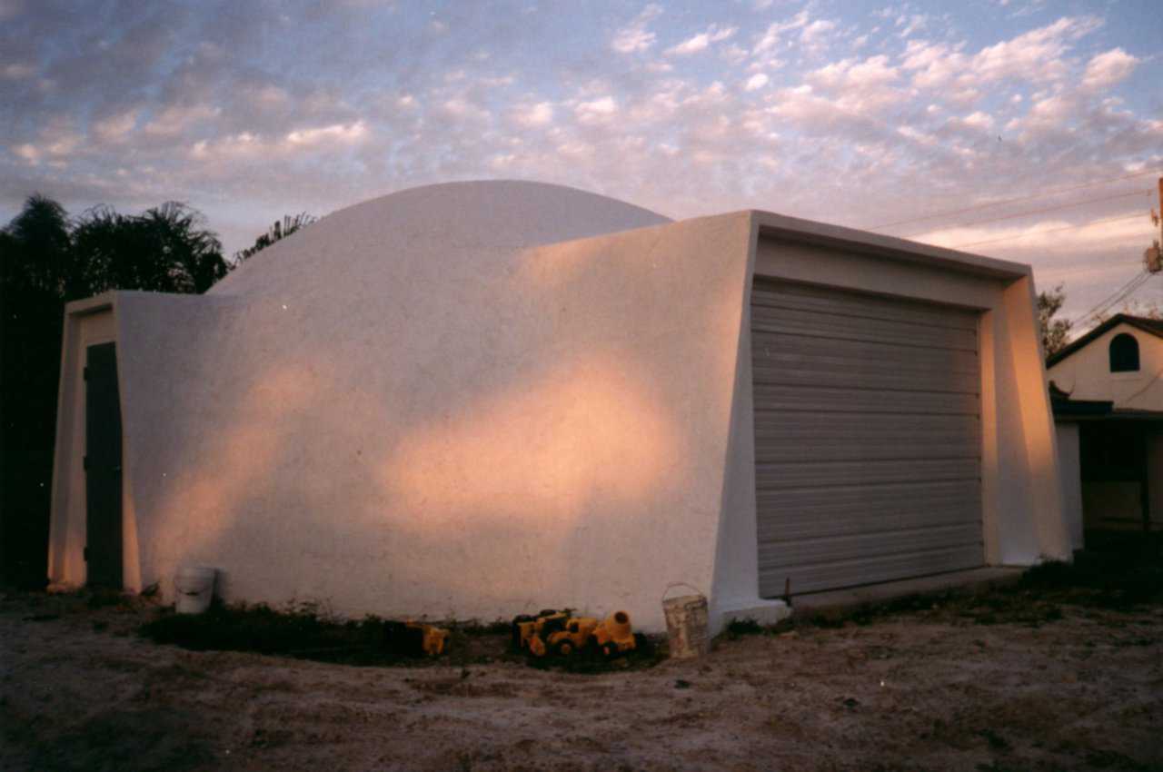This is a 40’ diameter Ecoshell that has been modified with two augmentations. It is an Ecoshell I that allows for the addition of the augmentations without modifying the Airform. It has  been coated with a tan color.