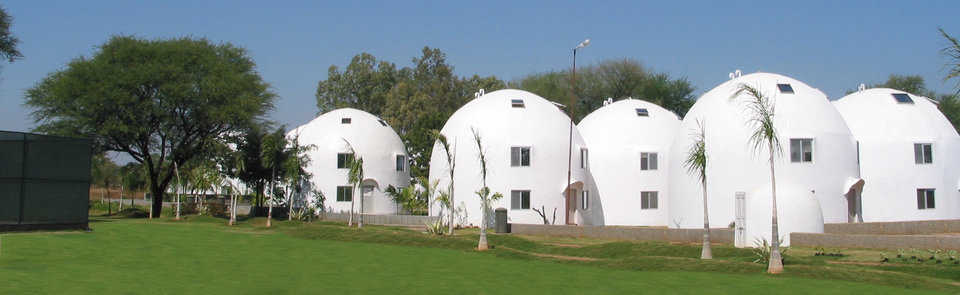 One hundred twenty-five Ecoshells were built in Hyderabad, India. Each of these buildings encompasses six apartments. The apartments are 40 square meters, which seems small by U.S. standards but luxurious in India. A few of the buildings were also designed as offices.