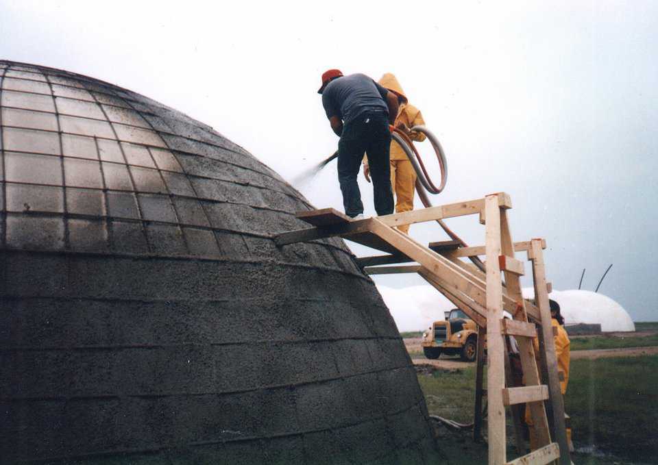 Ecoshell I can be built using strictly hand labor or the Shotcrete machine. Note the scaffolding. A simple, standard type, lean over scaffold works well for building these Ecoshells.