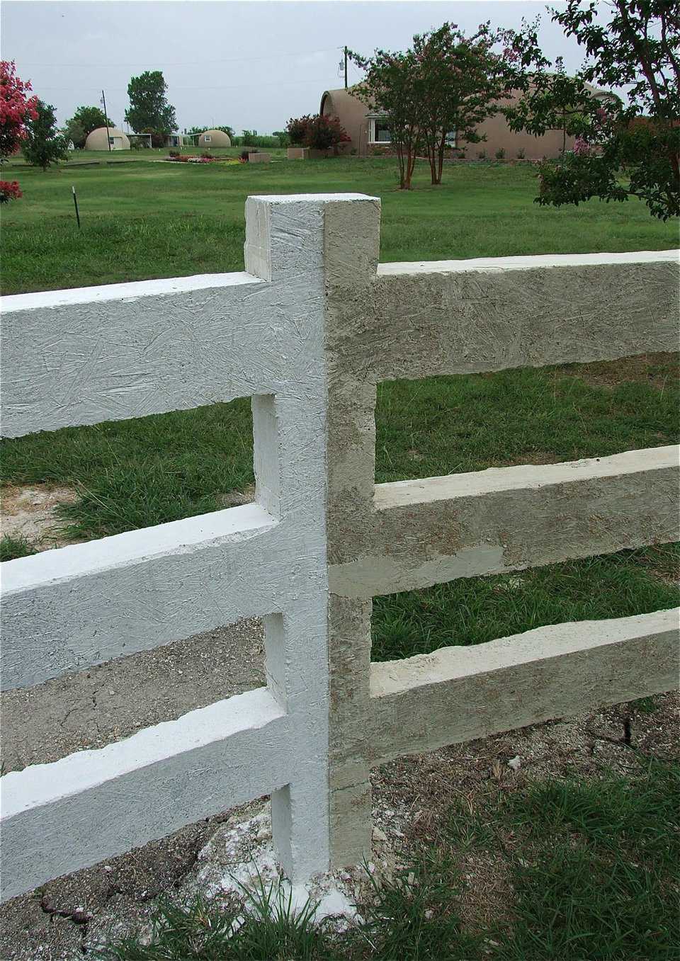 This middle section post is divided to show a couple of different fence coloring options. The left half has a lime ingredient included in the mixture that was used to white wash the fence. The right section was left unpainted to reveal the sandy-white colorant used in the original mix. In actuallity, the fence will never require painting and could remain a sandy-white color.