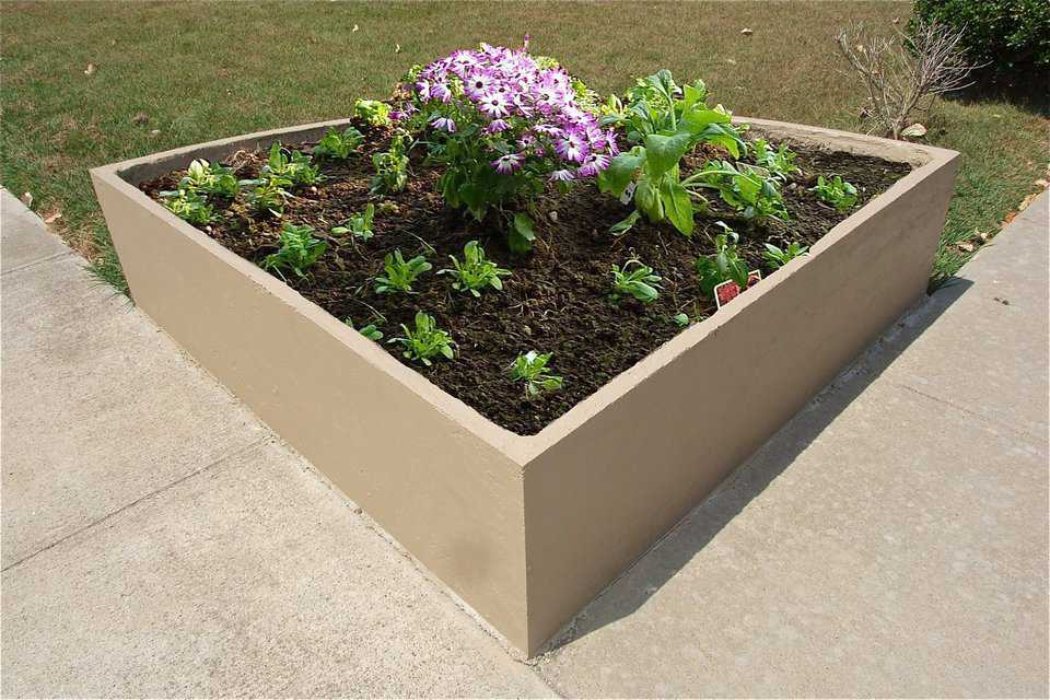 Custom shaped planters can be installed to elegantly enhance any property.