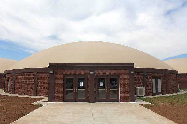 This Monolithic Dome arena, designed by Architect Lee Gray of Salt Lake City, Utah, has a diameter of 148’, a height of 51’ and seating for 1,409 spectators.